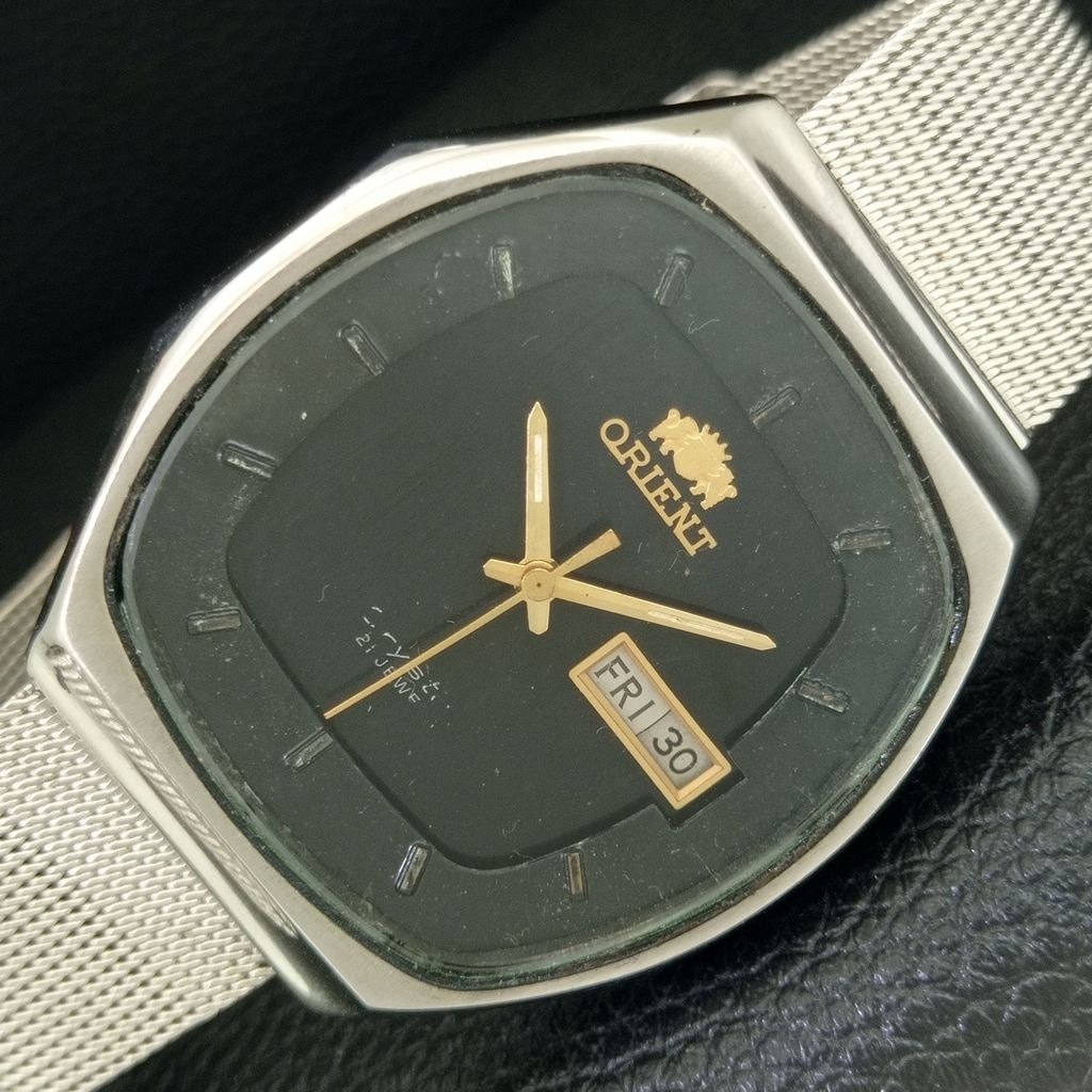Vintage 1984 Orient Automatic Mens Silver Watch WDaydate  Gold Accents
